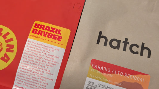 Two bags of specialty coffee in a gift box